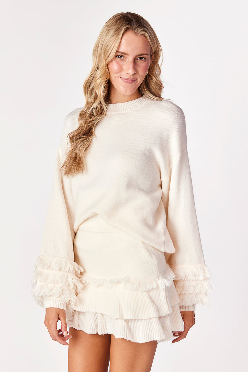 White ruffle jumper sale